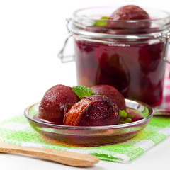 Whole Plum Compote. Selective focus.