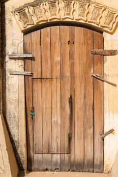 Closed old wooden door background in Myanmar temple