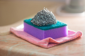 Foam and metal sponges for washing