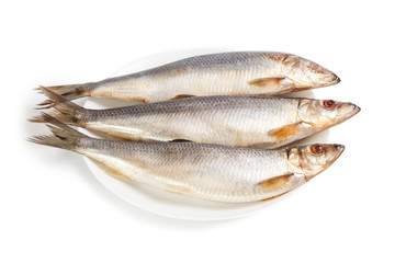 Salted herrings on a plate