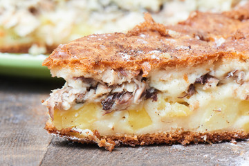 A piece of fish pie with potatoes