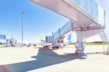Airplane ready for boarding in airport hub.