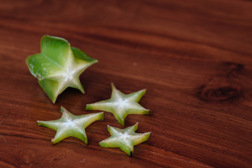 Star apple Carambola (Star Fruit) Fresh ripe star fruit in a woo