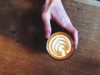 Professional coffee shop latte espresso on wooden table