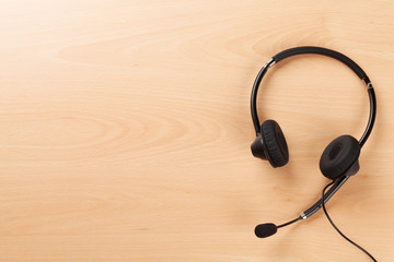 Office desk with headset. Call center support table