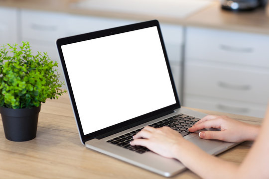 woman hands in laptop with isolated screen in the room
