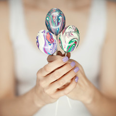 Woman hands holding easter egg