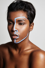 woman with a blue line on a face