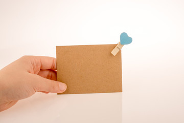 Piece of paper and clothespin