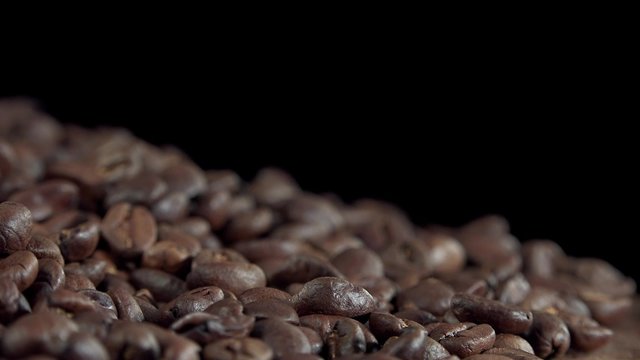 Portion of rotating Coffe Beans (not seamless loopable 4K UHD footage)