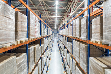 Huge distribution warehouse with high shelves