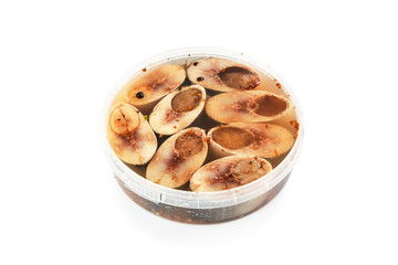 Salted herrings in a plastic pot
