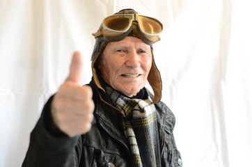 pilot with thumb up © eugene kashko