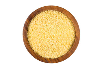 Raw couscous in a wooden bowl