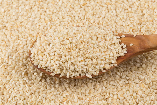 Macro view of sesame seeds on spoon