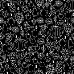 Vector seamless pattern with hand drawn isolated fruits on black color