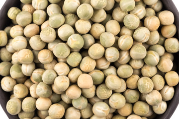 peas in a black plate