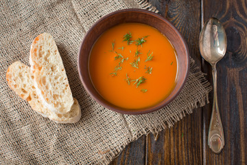 Pumpkin soup on a wooden table