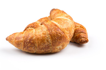 Croissant over white background