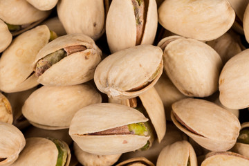 Pistachio nuts arranges as background