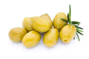 Olives on leaves isolated on white.