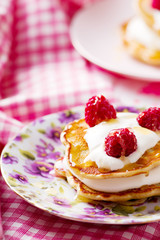 pancakes with sour cream and raspberry