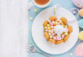 Easter food colorful background of candy biscuits and fondant bu
