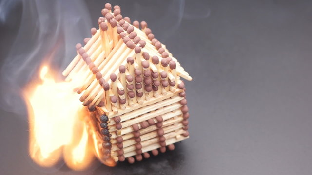Burning match house slow motion
