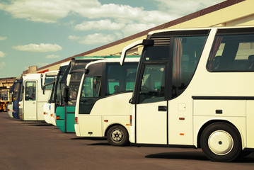 Fototapeta na wymiar buses at the bus station with cloudy sky