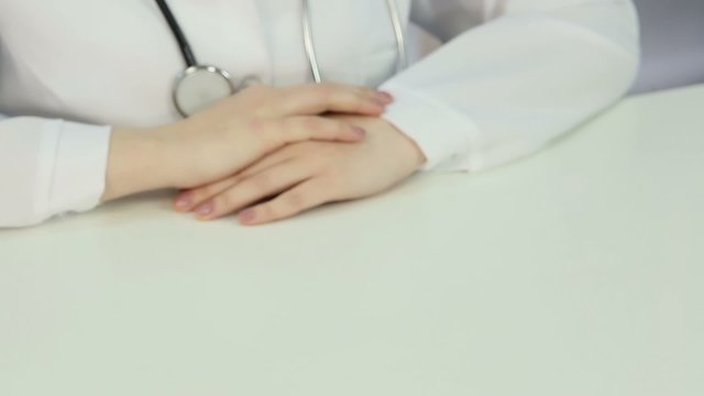 Pharmaceutical Sales Representative Shaking Female Doctor's Hand, Making A Deal