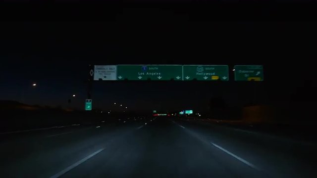 Los Angeles, California, USA - February 7, 2016:  Los Angeles 101 and Golden State 5 freeway signs driving shot in downtown LA.