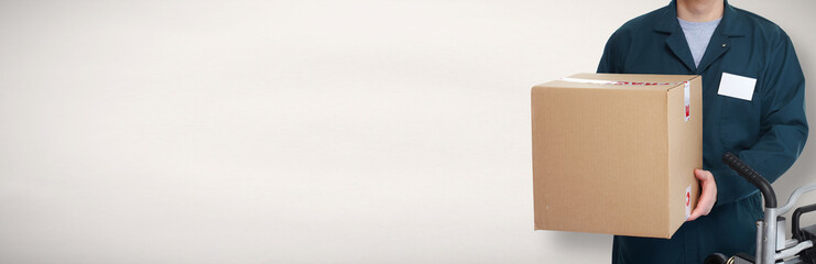 Delivery postman with a box.