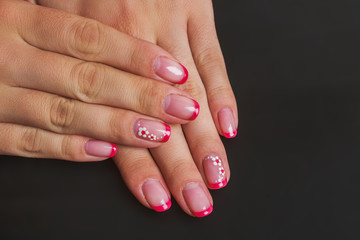 Red french nail art with flower