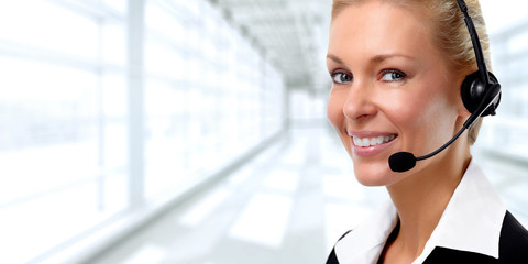 Smiling agent woman with headsets.