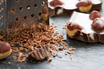 chocolate with nuts grated on a grater