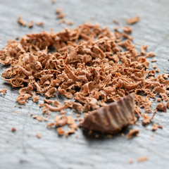 chocolate with nuts grated on a grater