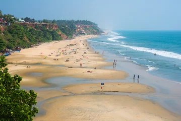 Gordijnen Varkala beach, Kerala, India, a popular beach area in Kerala state © David Bokuchava