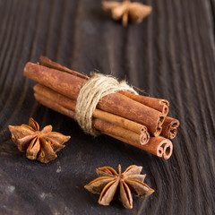 cinnamon and star anise on a wooden background