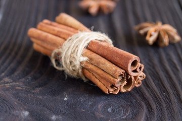 cinnamon and star anise on a wooden background