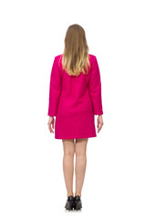 Pretty girl in pink dress isolated on white