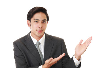 案内するビジネスマン