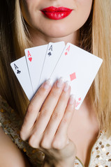 Young woman in casino gambling concept