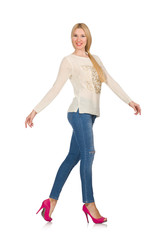 Blond hair woman posing in blue jeans isolated on white