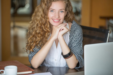 Successful Businesswoman relaxed and satisfied