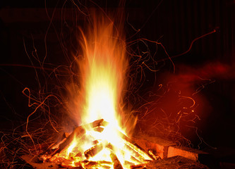 Colorful vibrant Bonfire outdoors at night