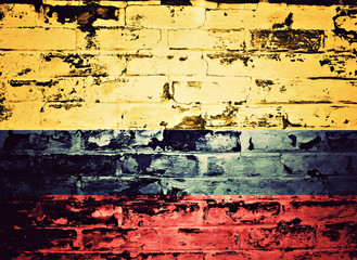 flag of Colombia painted on brick wall