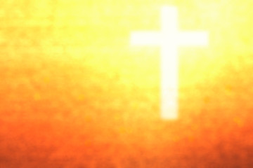 abstract blurred christ cross sign/symbolic over gold color back