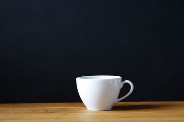 Coffee cup on wooden table