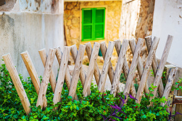 On the streets of Banyalbufar. Wooden fence. Majorca. Balearic Islands. Spain