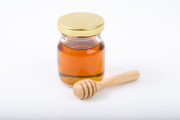 
drizzler dripped in honey with glass jar